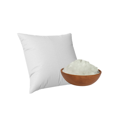 White pillow next to a wooden bowl filled with Shimul tula on a white background