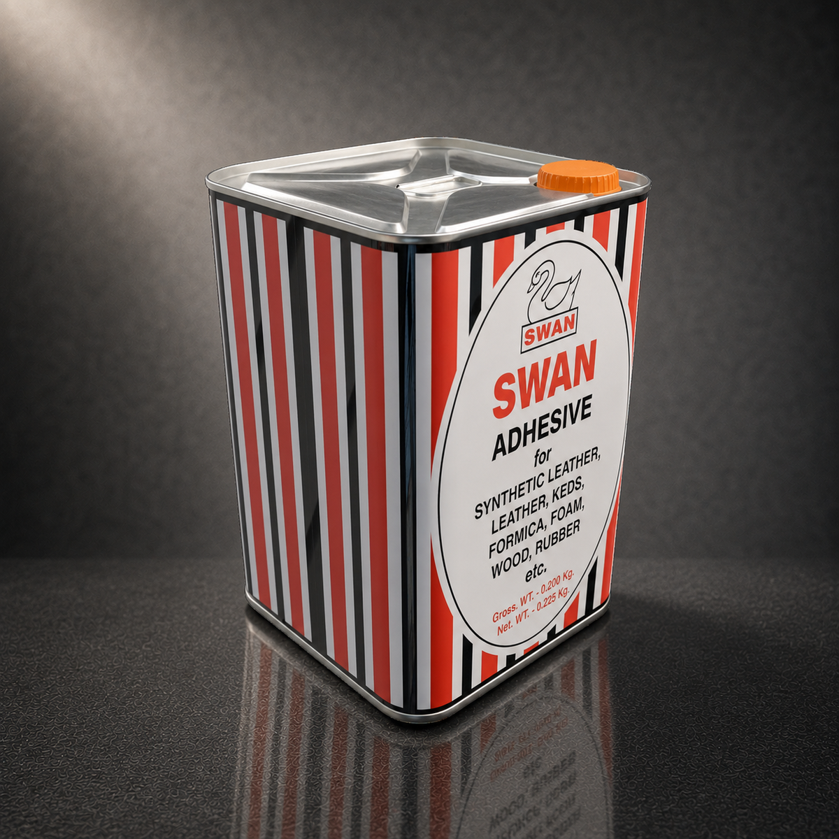 A square metal tin of SWAN Synthetic Leather, Leather Kess, Formica, Foam, Wood, and Rubber Adhesive, featuring a red, black, and white striped pattern with a white oval label and an orange cap, set against a dark gray reflective background.
