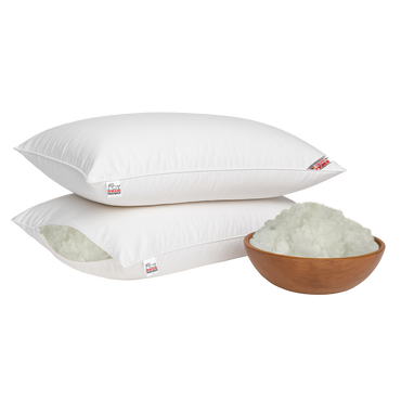 Two white super micro fiber pillows with a bowl of white super micro fiber on a white background