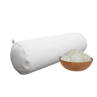 White side pillow next to a wooden bowl filled with shimul tula on a white background