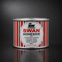 A metal tin of Swan Adhesive for synthetic leather, keds, formica, foam, wood, and rubber, featuring a red, white, and black striped label with the Swan logo, set against a dark gray background with a reflection below.